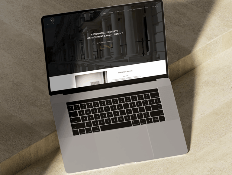 Marsh Miller website displayed on a laptop