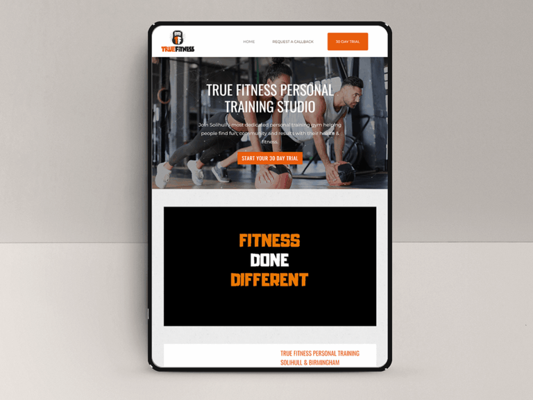 True Fitness Studio website displayed on a tablet