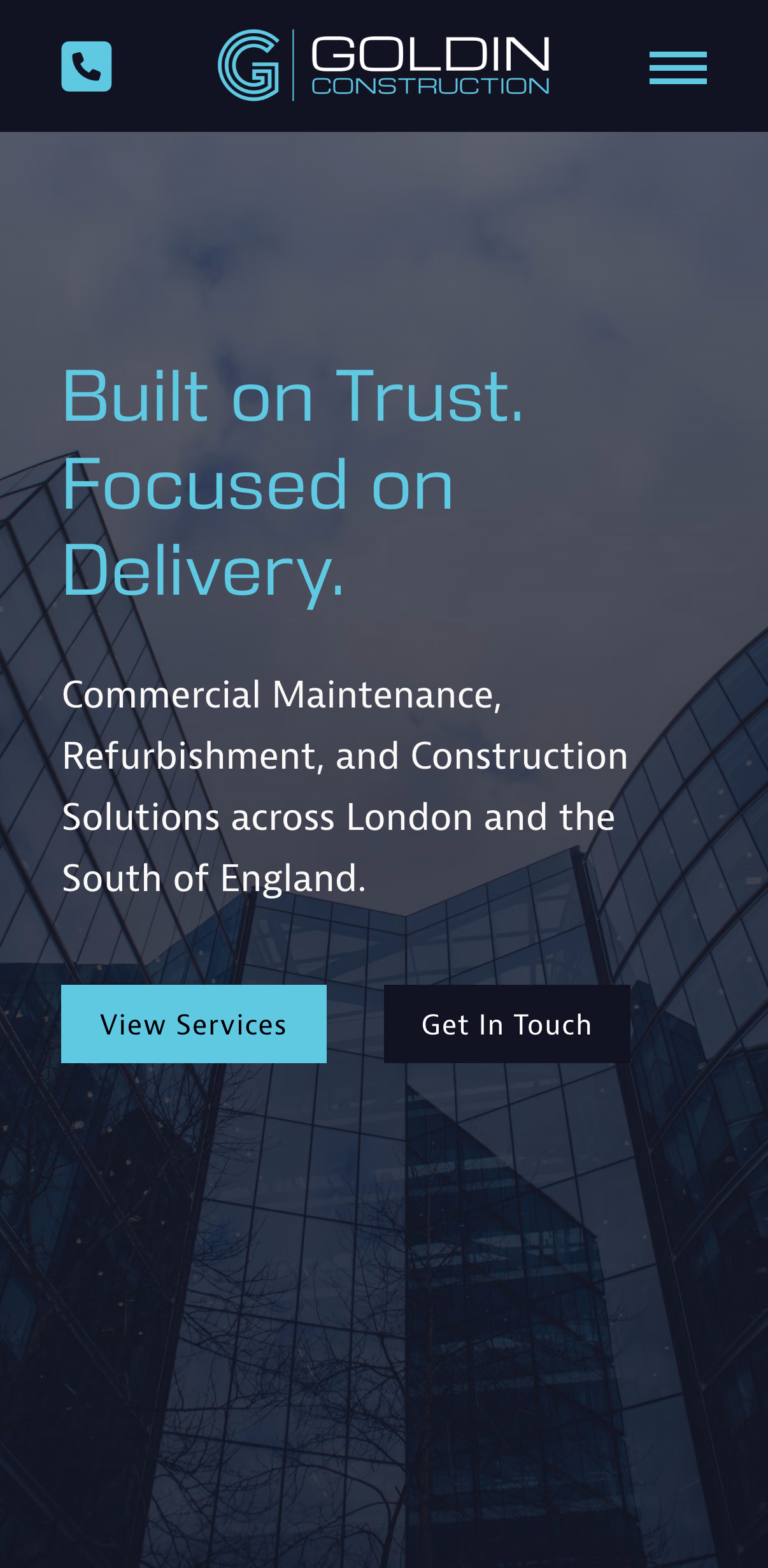 Goldin Construction website on an iPhone, with the headline Built on Trust, Focused on Delivery over a photo of a glass office building, and two buttons