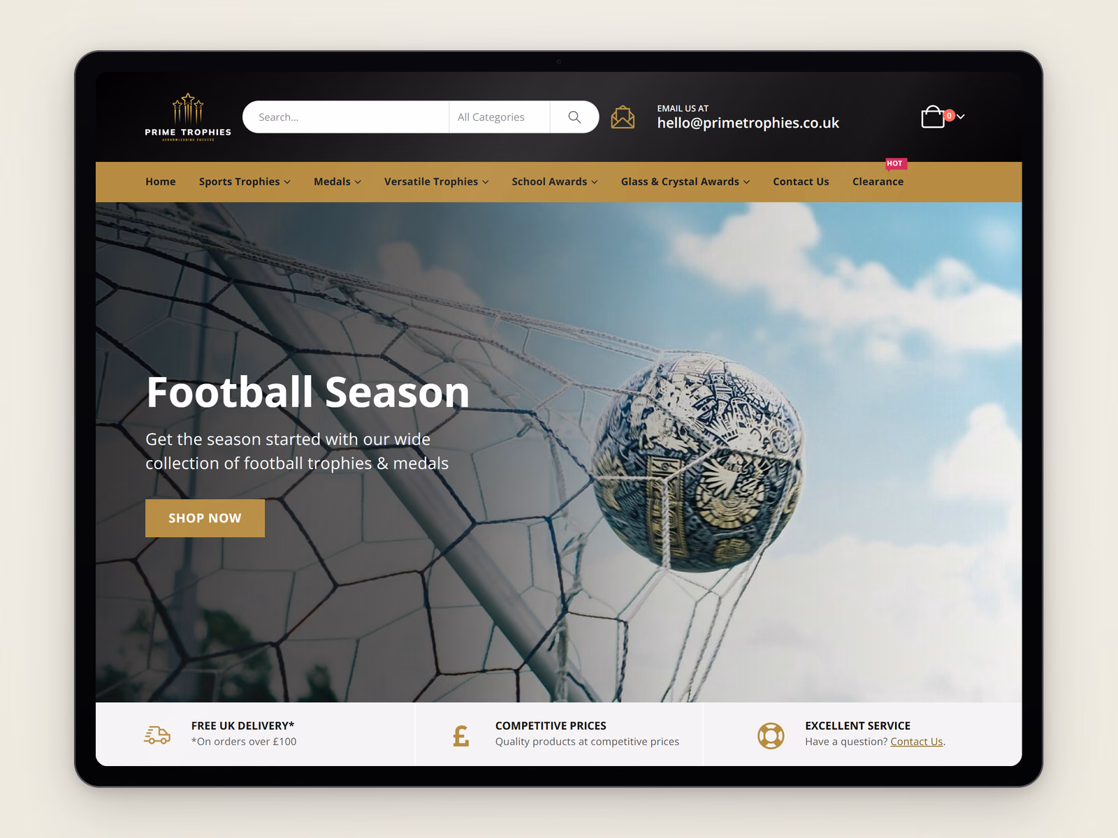 Prime Trophies website displayed on a tablet