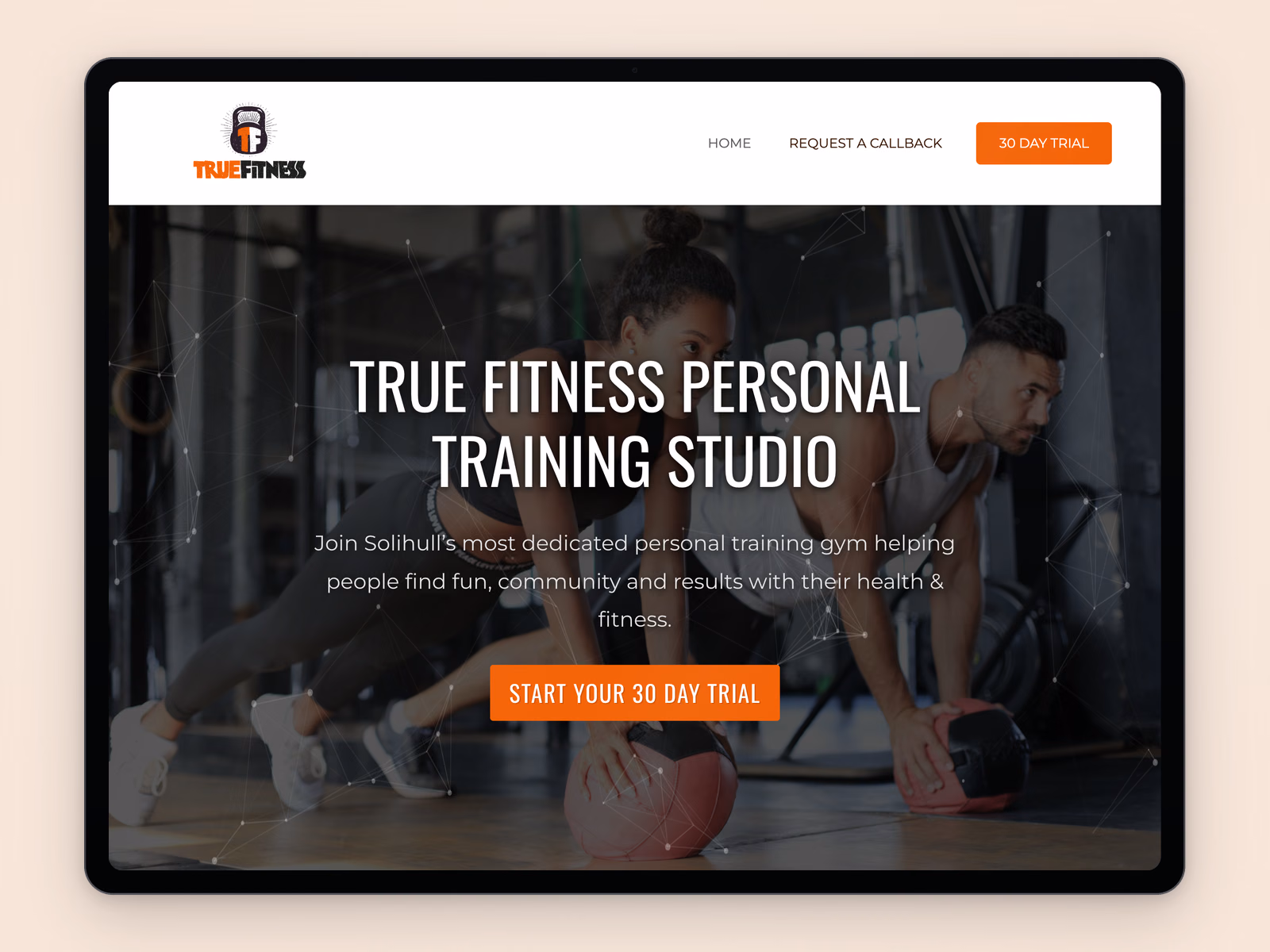 True fitness studio website example on a tablet
